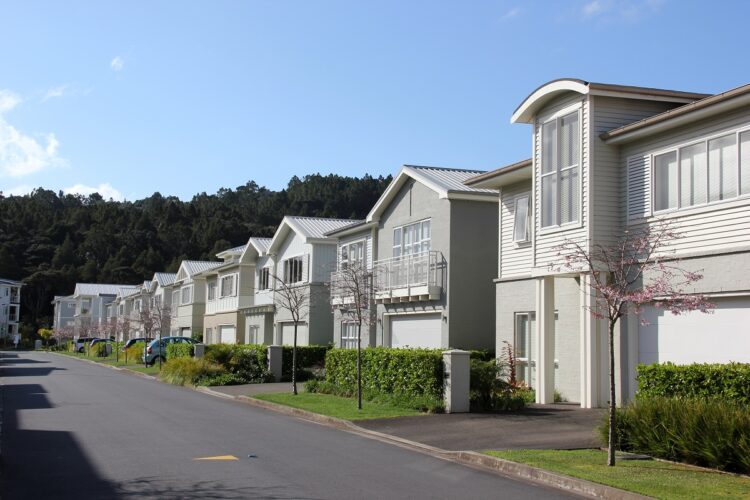 "New residential land under development in Auckland, New Zealand. Shortages of housing in the city means new subdivisions are quickly filled. Shortage of housing is also leading to high house prices. This is Kensington Park north of Auckland. Modern infill compact housing."