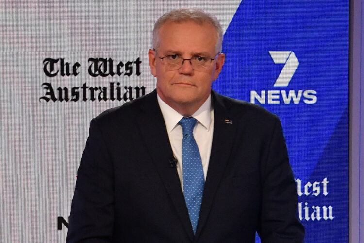 Australian Prime Minister Scott Morrison attends the third leaders' debate at the Seven Network Studios during the 2022 federal election campaign, in Sydney, Australia May 11, 2022. Mick Tsikas/Pool via REUTERS